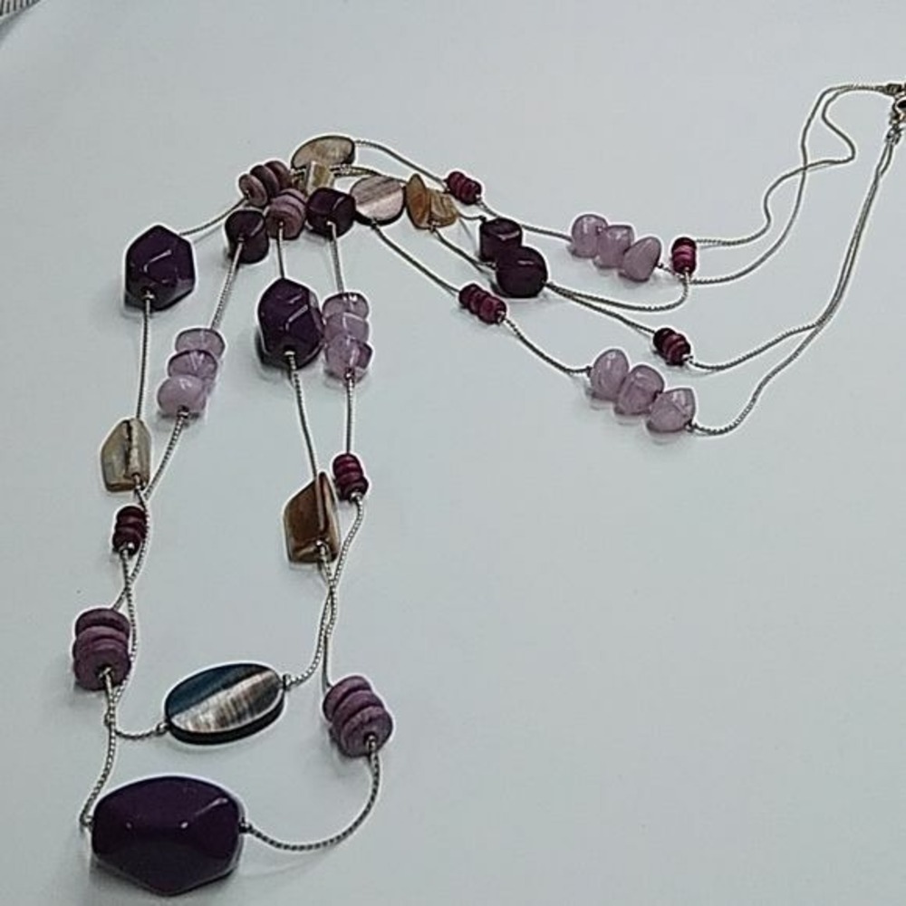 Double‎ strand mother of pearl and purple floating bead necklace